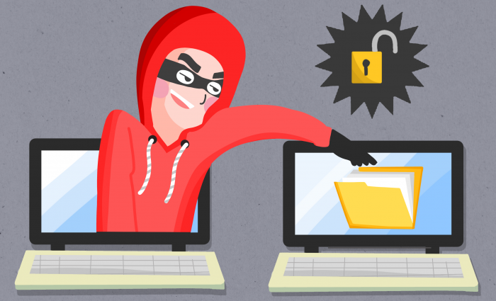 homem roubando dados pessoais de computador